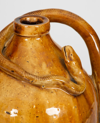 Rare Large-Sized Indiana Stoneware Snake Jug w/ Applied Skull and Crossbones and Turtle