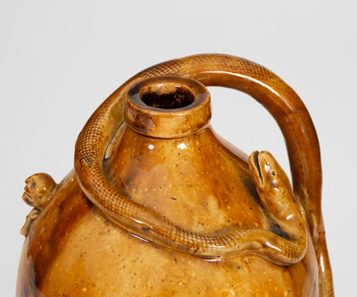 Unusual Midwestern Stoneware Snake Jug with Applied Skull and Crossbones and Turtle