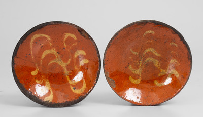 Scarce Pair of Slip-Decorated Pennsylvania Redware Tart Plates, 19th century