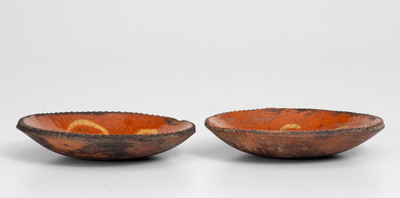 Scarce Pair of Slip-Decorated Pennsylvania Redware Tart Plates, 19th century