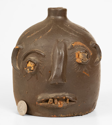 Scarce Glazed Stoneware Face Jug w/ Rock Eyes and Teeth, attrib. Casey Meaders, GA or NC origin, early 20th century