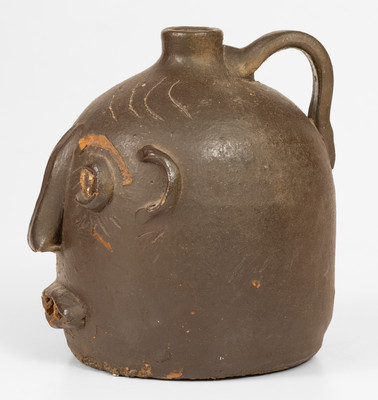 Scarce Glazed Stoneware Face Jug w/ Rock Eyes and Teeth, attrib. Casey Meaders, GA or NC origin, early 20th century