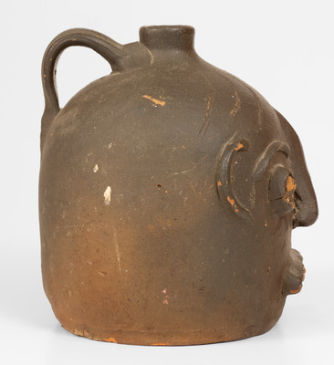 Scarce Glazed Stoneware Face Jug w/ Rock Eyes and Teeth, attrib. Casey Meaders, GA or NC origin, early 20th century