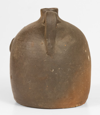 Scarce Glazed Stoneware Face Jug w/ Rock Eyes and Teeth, attrib. Casey Meaders, GA or NC origin, early 20th century