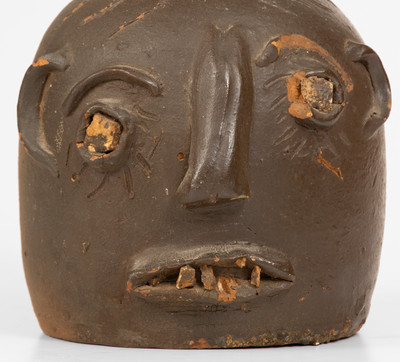 Scarce Glazed Stoneware Face Jug w/ Rock Eyes and Teeth, attrib. Casey Meaders, GA or NC origin, early 20th century