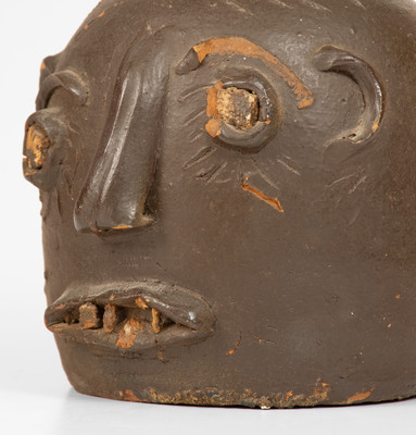 Scarce Glazed Stoneware Face Jug w/ Rock Eyes and Teeth, attrib. Casey Meaders, GA or NC origin, early 20th century