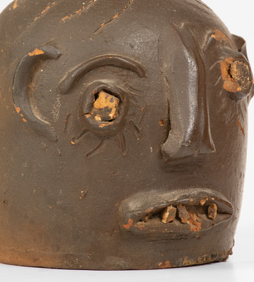 Scarce Glazed Stoneware Face Jug w/ Rock Eyes and Teeth, attrib. Casey Meaders, GA or NC origin, early 20th century