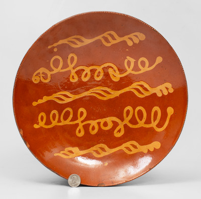 Fine Redware Charger w/ Looping Yellow Slip Decoration, probably Pennsylvania
