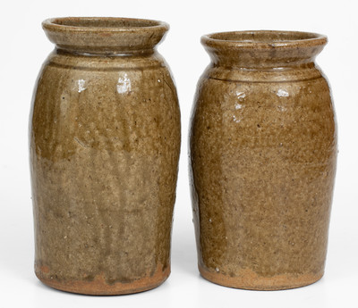 Pair of Alkaline-Glazed Stoneware Canning Jars, Incised 