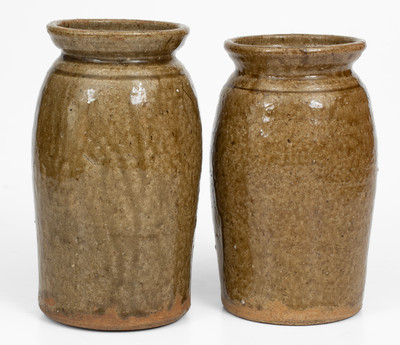 Pair of Alkaline-Glazed Stoneware Canning Jars, Incised