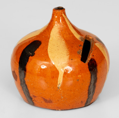 Unusual Redware Bank with Two-Color Slip Decoration