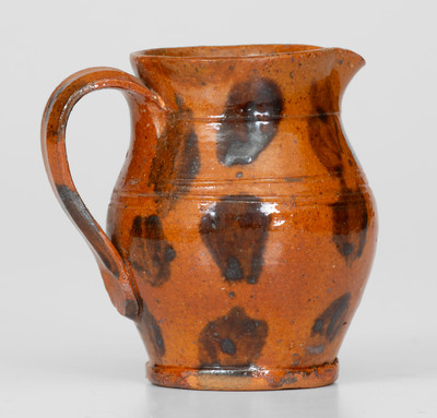 Fine Miniature Redware Pitcher with Profuse Manganese Decoration