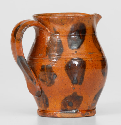 Fine Miniature Redware Pitcher with Profuse Manganese Decoration