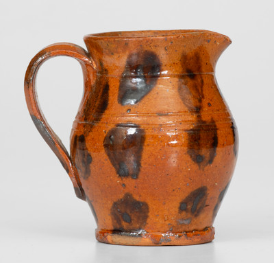 Fine Miniature Redware Pitcher with Profuse Manganese Decoration