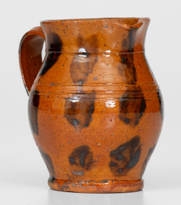 Fine Miniature Redware Pitcher with Profuse Manganese Decoration