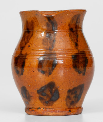 Fine Miniature Redware Pitcher with Profuse Manganese Decoration