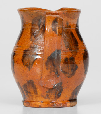 Fine Miniature Redware Pitcher with Profuse Manganese Decoration