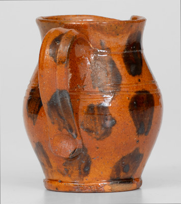 Fine Miniature Redware Pitcher with Profuse Manganese Decoration