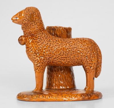 Rare Glazed Pennsylvania Redware Figure of a Sheep with Stump