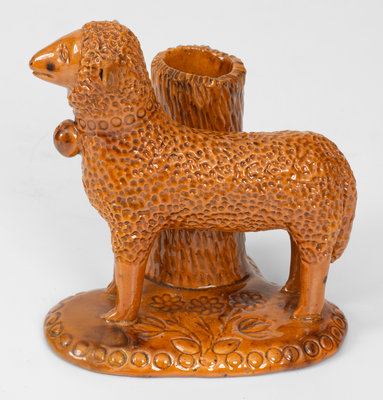 Rare Glazed Pennsylvania Redware Figure of a Sheep with Stump