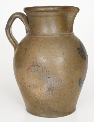 Midwestern Stoneware Pitcher with Incised Floral Decoration