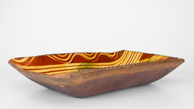 Exceptional Slip-Decorated Philadelphia Redware Loaf Dish, 18th century