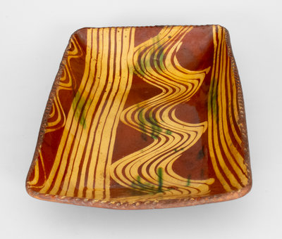 Exceptional Slip-Decorated Philadelphia Redware Loaf Dish, 18th century