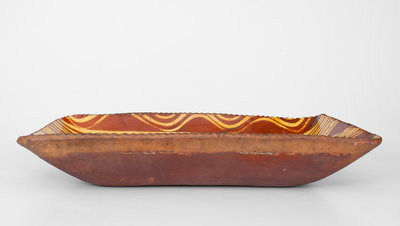 Exceptional Slip-Decorated Philadelphia Redware Loaf Dish, 18th century