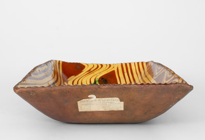 Exceptional Slip-Decorated Philadelphia Redware Loaf Dish, 18th century