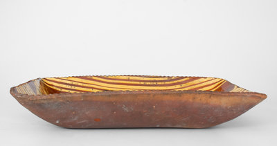 Exceptional Slip-Decorated Philadelphia Redware Loaf Dish, 18th century