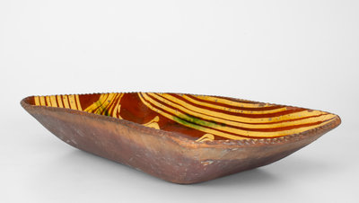 Exceptional Slip-Decorated Philadelphia Redware Loaf Dish, 18th century