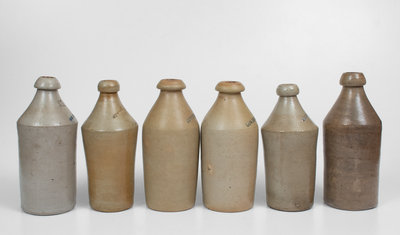 Lot of Six: Stoneware Bottles incl. HARRISBURG, PA and COWDEN & WILCOX Examples