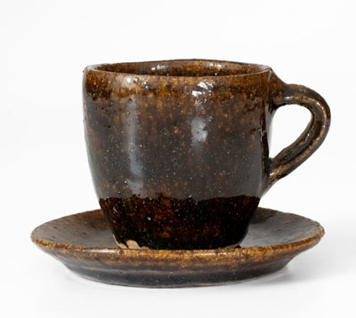 Very Rare Alkaline-Glazed Stoneware Cup and Saucer, probably Buncombe County, NC, late 19th century