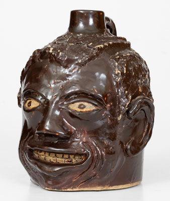 Very Rare Paducah, Kentucky Face Jug, attrib. Ernest Galloway or an Associate, early 20th century