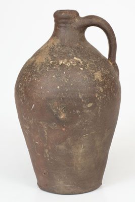 Quart-Sized Iron-Dipped Stoneware Jug, attrib. Chester Webster, Fayetteville, NC, c1825