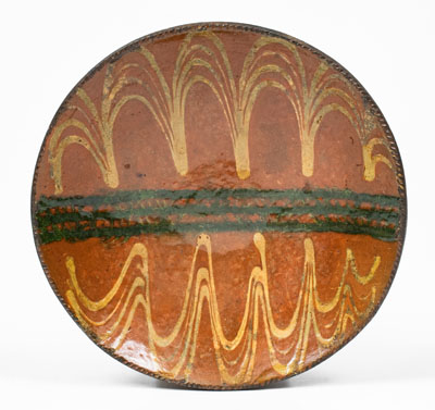 Pennsylvania Redware Plate w/ Yellow and Copper Slip Decoration, possibly Philadelphia