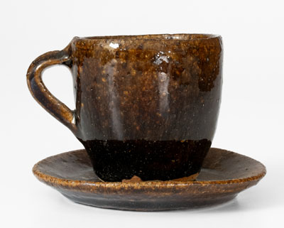 Very Rare Alkaline-Glazed Stoneware Cup and Saucer, probably Buncombe County, NC, late 19th century