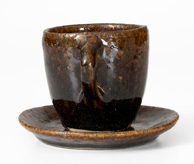 Very Rare Alkaline-Glazed Stoneware Cup and Saucer, probably Buncombe County, NC, late 19th century