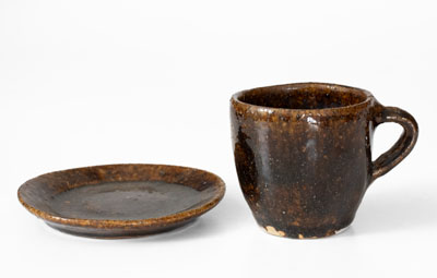 Very Rare Alkaline-Glazed Stoneware Cup and Saucer, probably Buncombe County, NC, late 19th century