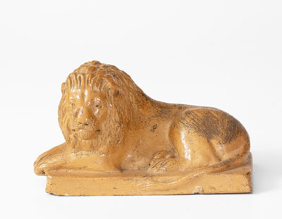 Molded American Stoneware Reclining Lion Figure, 19th century