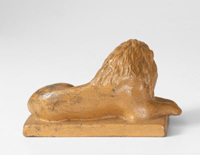 Molded American Stoneware Reclining Lion Figure, 19th century