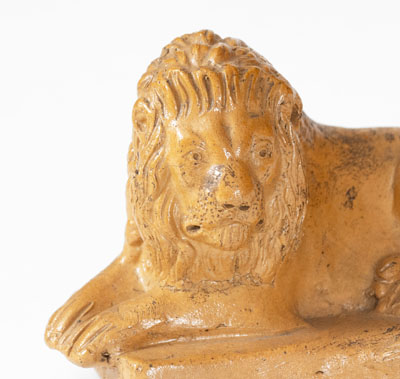 Molded American Stoneware Reclining Lion Figure, 19th century