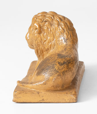 Molded American Stoneware Reclining Lion Figure, 19th century