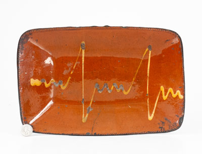 Unusual Slip-Decorated Redware Loaf Dish, probably Huntington, Long Island or Norwalk, CT, c1840