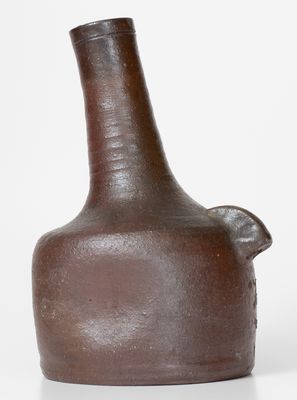 Rare Salt-Glazed Stoneware Face Bottle, Incised