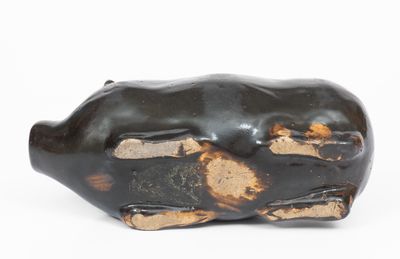 Albany-Slip-Glazed Stoneware Pig Bottle, Midwestern origin, circa 1885