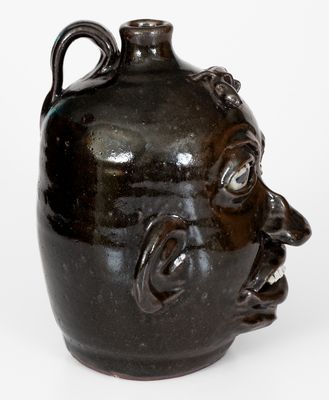 Chester Hewell Face Jug with Lizard, Signed "Chester Hewell - 1997 - CSA"