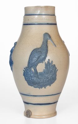 Cobalt-Decorated Stoneware Pitcher w/ Molded Stork and Human Motifs, attrib. White's Utica