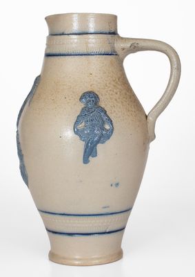 Cobalt-Decorated Stoneware Pitcher w/ Molded Stork and Human Motifs, attrib. White's Utica