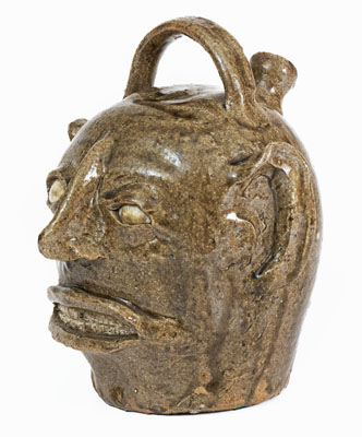 Exceptional Edgefield District, South Carolina Stoneware Face Harvest Jug